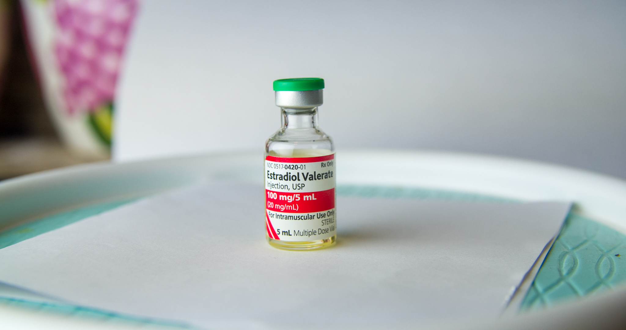 A macro shot of an Estradiol Valerate vial